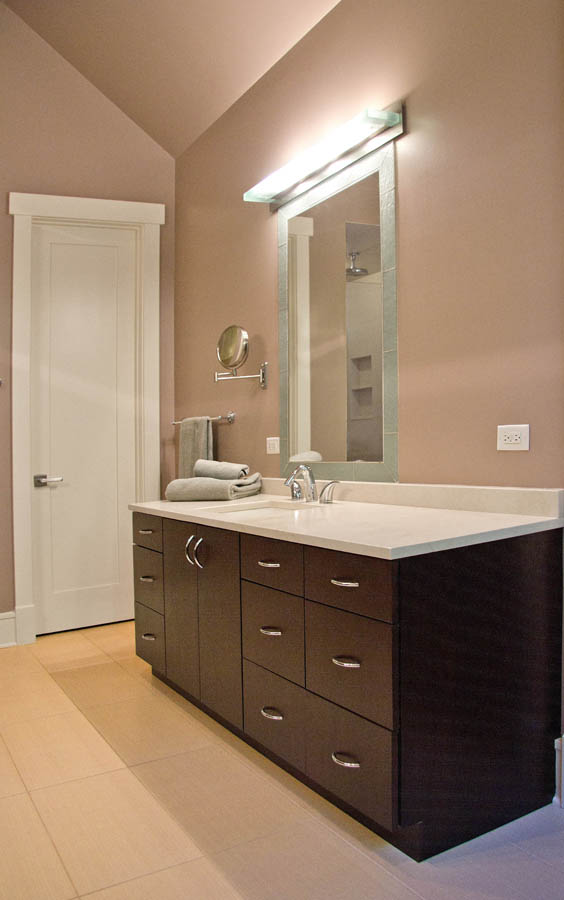 A bathroom vanity with lighting