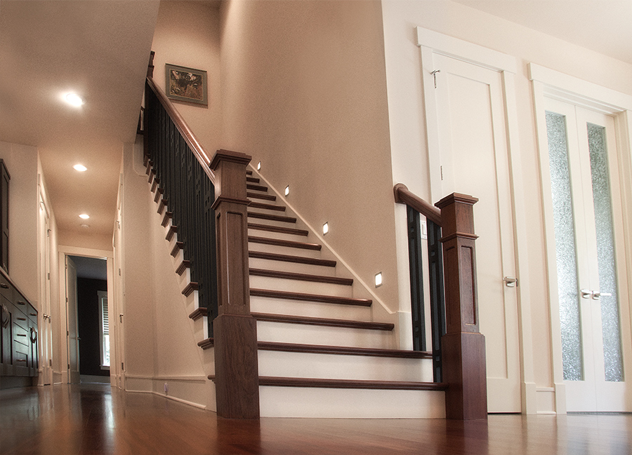 A staircase with handrails